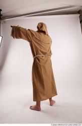 JOEL_ADAMSON WITH CRUCIFIX AND SWORD